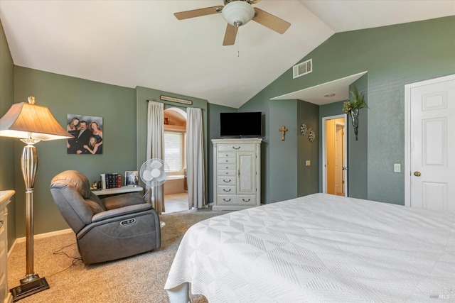 carpeted bedroom featuring lofted ceiling, ceiling fan, and visible vents