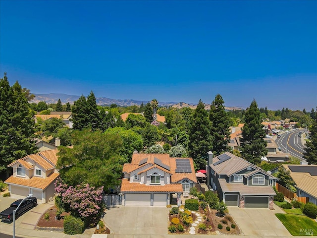 aerial view featuring a mountain view and a residential view