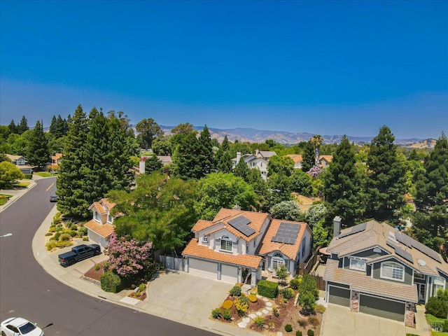 bird's eye view featuring a residential view and a mountain view