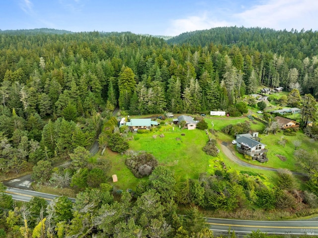 aerial view featuring a view of trees