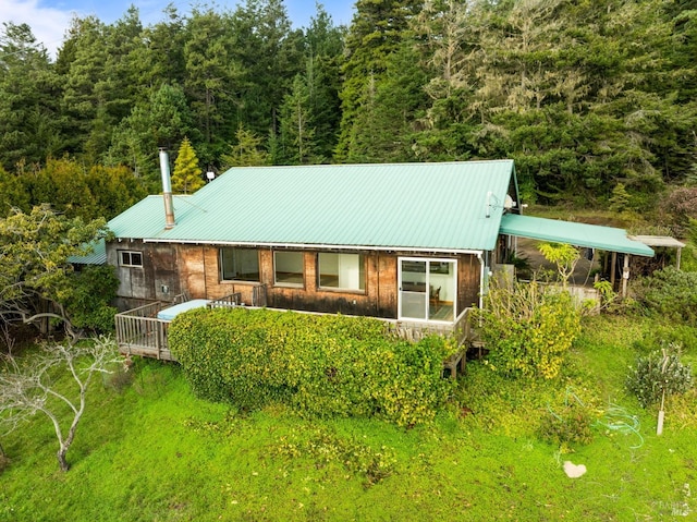 view of front of home featuring metal roof