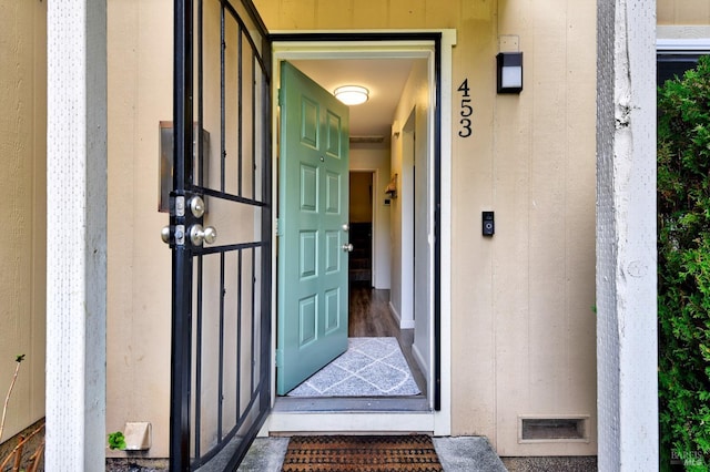 property entrance with visible vents