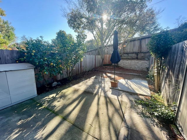 exterior space with a fenced backyard