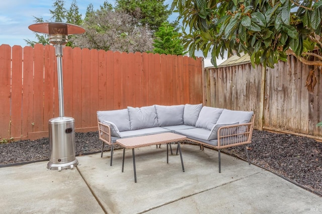 view of patio / terrace featuring outdoor lounge area and a fenced backyard