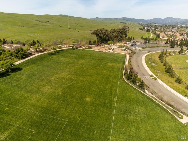 aerial view with a mountain view and a rural view