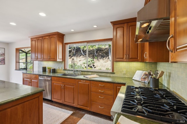 kitchen with dishwasher, extractor fan, dark countertops, and a sink