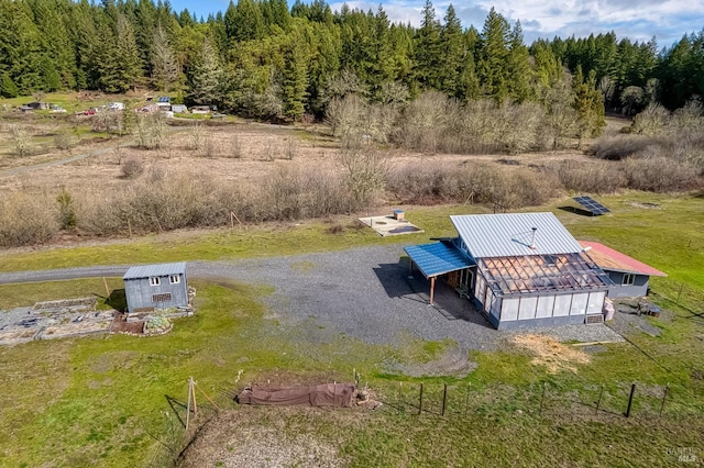 aerial view featuring a view of trees