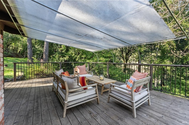 wooden deck featuring an outdoor hangout area