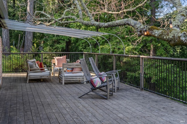 wooden deck with an outdoor hangout area