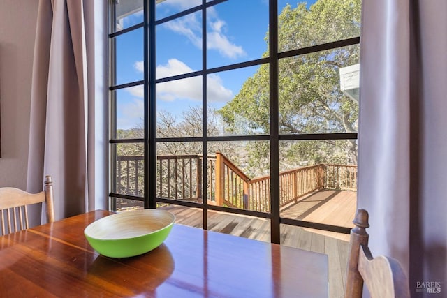 interior space featuring a wall of windows