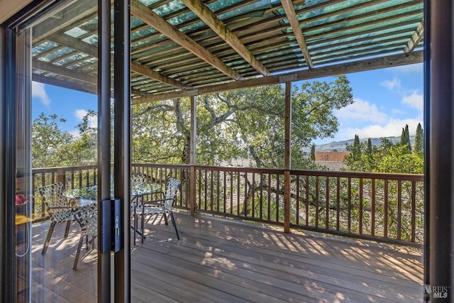 wooden deck with outdoor dining area