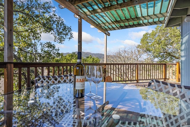 deck featuring outdoor dining area