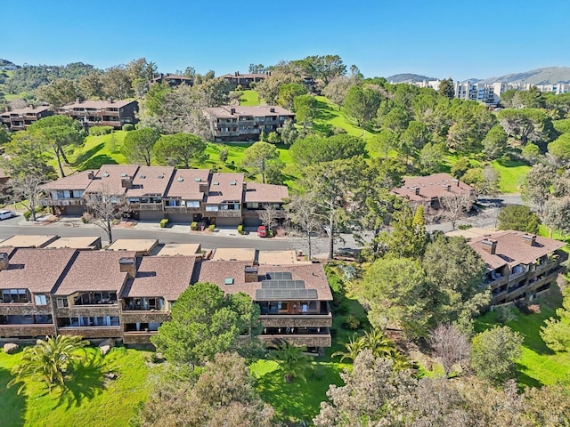 bird's eye view featuring a residential view and a mountain view