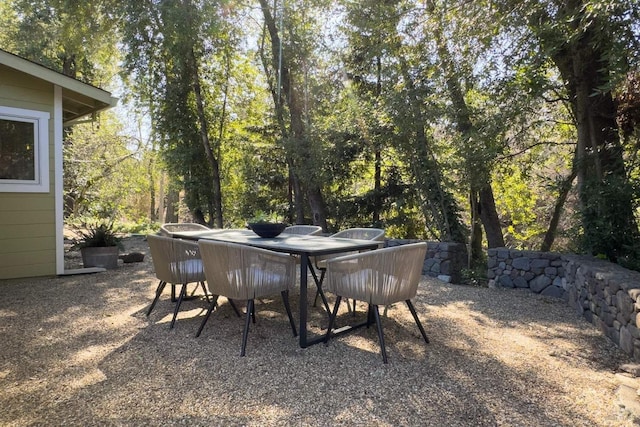 exterior space with outdoor dining area