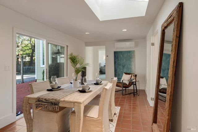 dining space featuring light tile patterned flooring, a wall unit AC, recessed lighting, a skylight, and baseboards