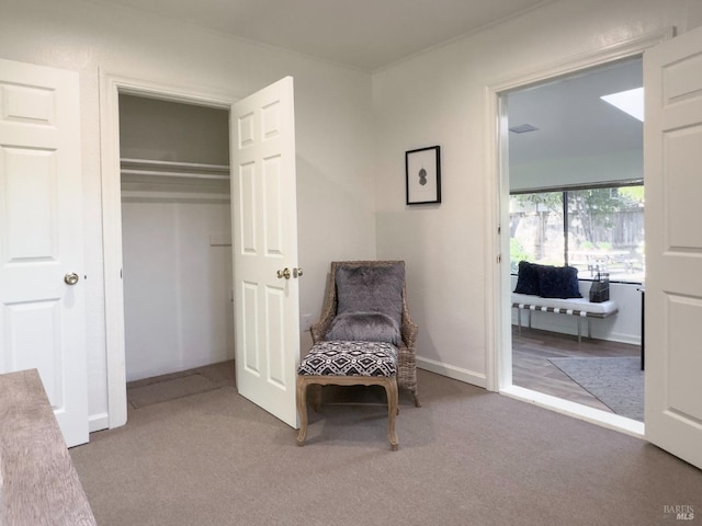 unfurnished room featuring carpet and baseboards