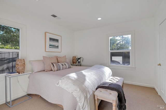 bedroom with recessed lighting, baseboards, visible vents, and light colored carpet