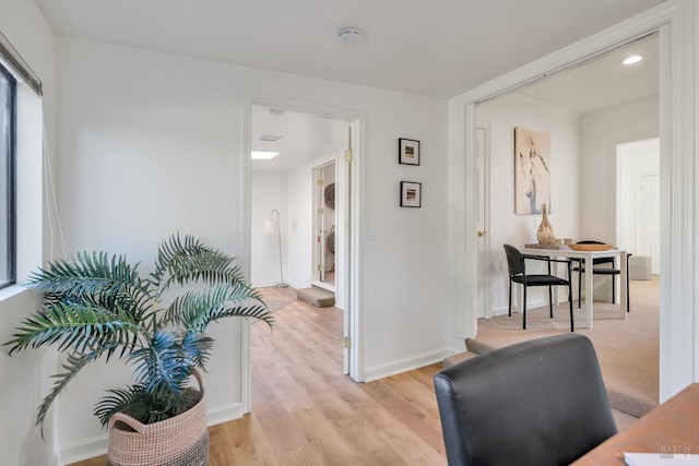 office area with light wood finished floors, recessed lighting, and baseboards