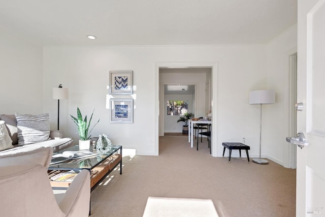 living room with carpet floors and baseboards