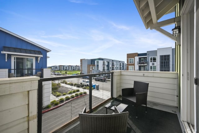 balcony featuring a view of city