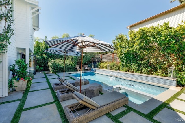 pool with a patio