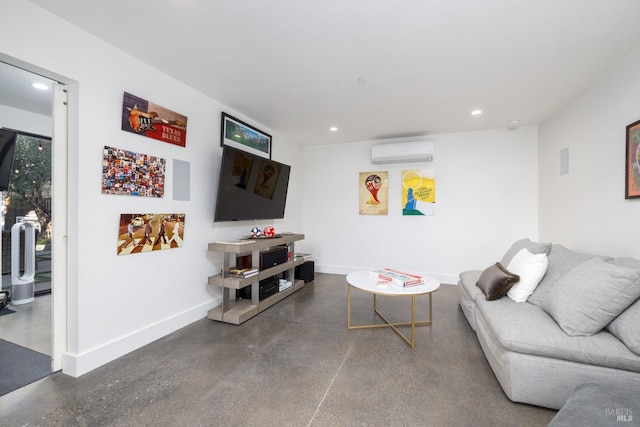 living room featuring finished concrete floors, recessed lighting, baseboards, and a wall mounted AC