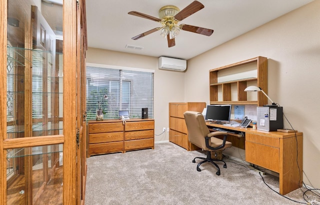 office area with a ceiling fan, light colored carpet, visible vents, and a wall mounted AC