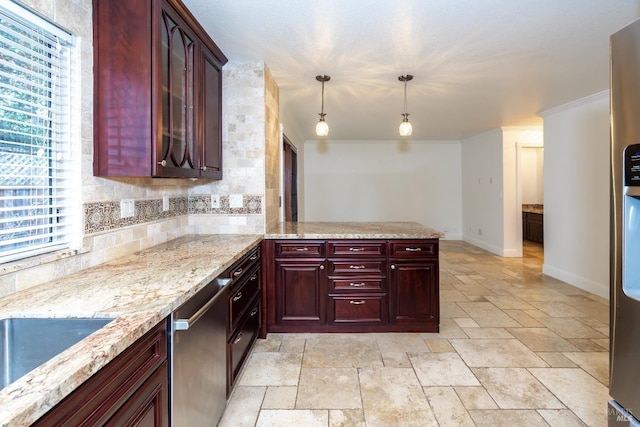 kitchen featuring stone tile floors, a peninsula, dark brown cabinets, dishwasher, and tasteful backsplash