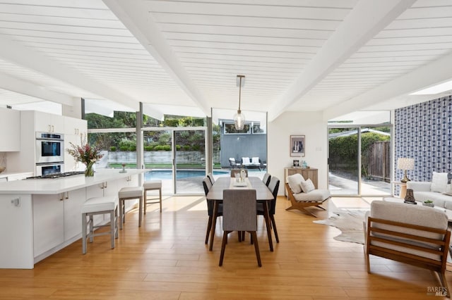 sunroom / solarium with beam ceiling