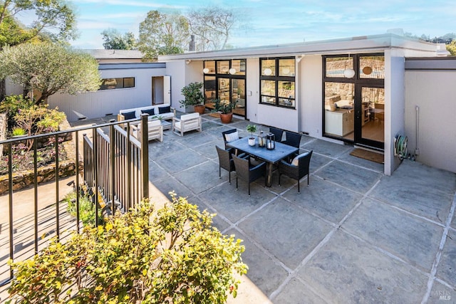 view of patio featuring french doors