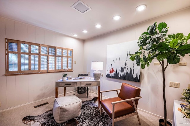 carpeted office space with visible vents and recessed lighting