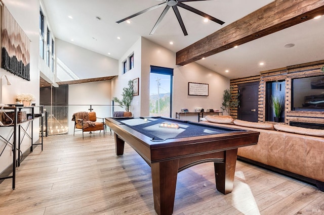 rec room with high vaulted ceiling, light wood-type flooring, pool table, and beamed ceiling