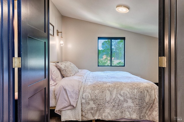 bedroom with vaulted ceiling