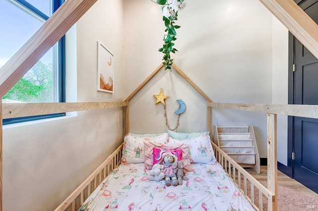 bedroom featuring wood finished floors