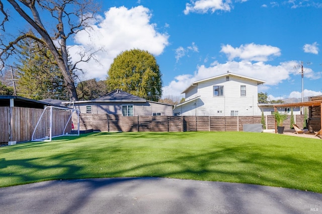 view of yard with fence