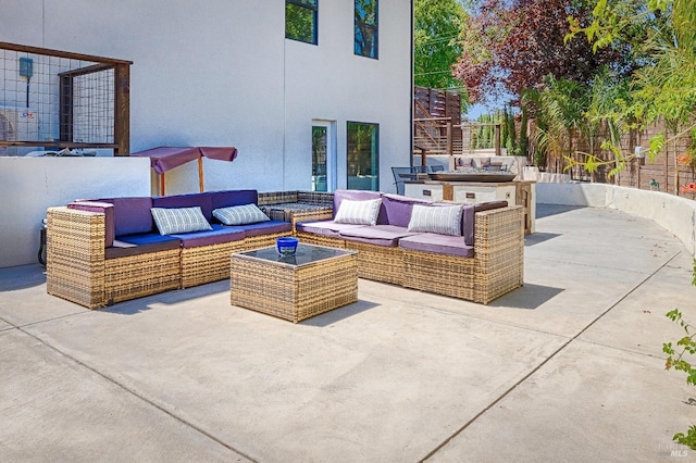 view of patio featuring stairway and outdoor lounge area