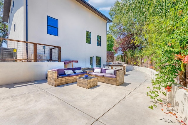 view of patio with an outdoor living space