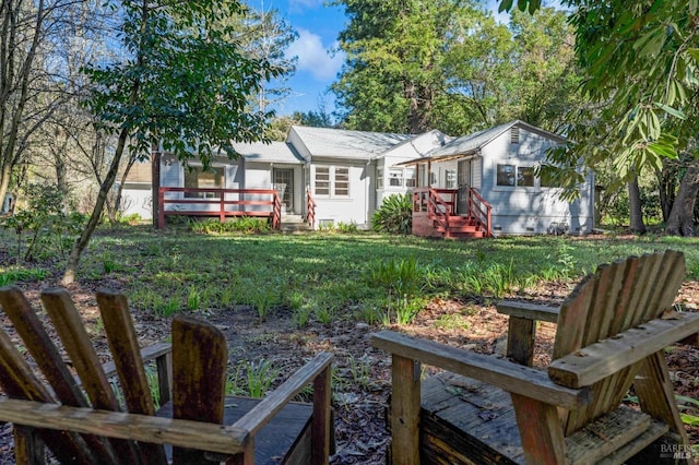 view of yard featuring a wooden deck