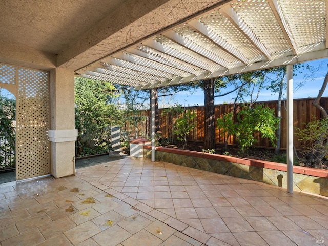 view of patio with a fenced backyard and a pergola