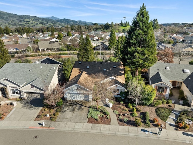 bird's eye view featuring a residential view and a mountain view