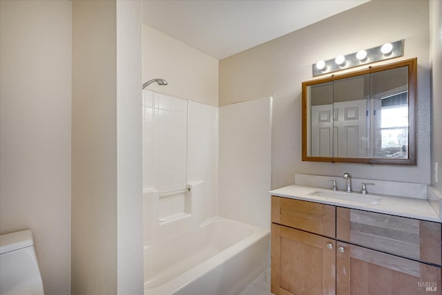 bathroom with bathing tub / shower combination, toilet, and vanity