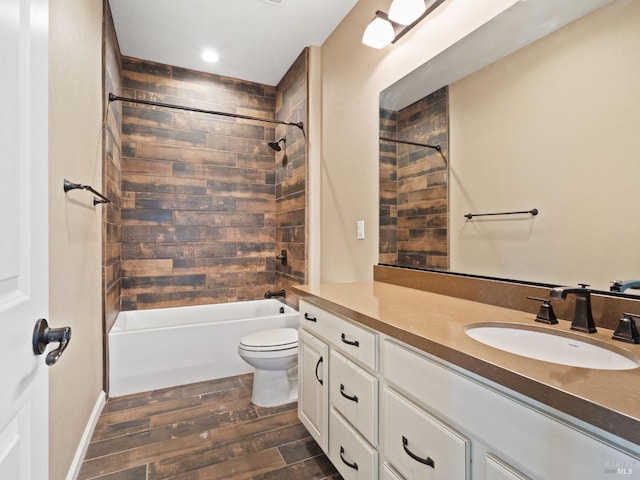 full bathroom featuring vanity, shower / tub combination, wood finished floors, and toilet