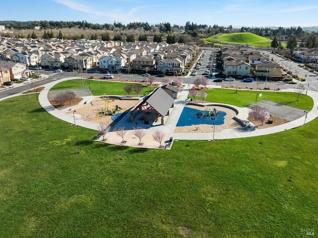 birds eye view of property with a residential view