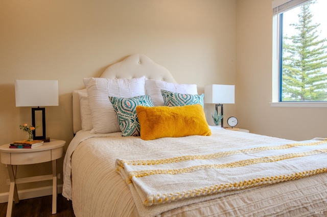 bedroom featuring wood finished floors