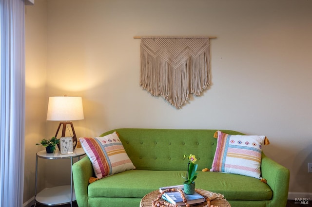 sitting room featuring baseboards