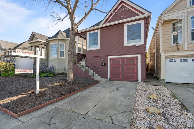 view of front facade featuring driveway and a garage