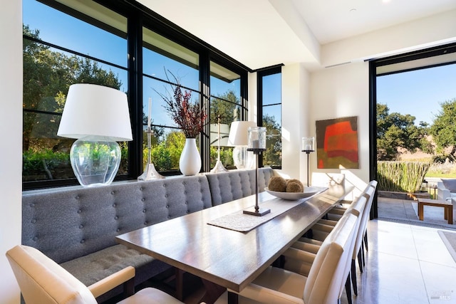 dining space featuring tile patterned floors