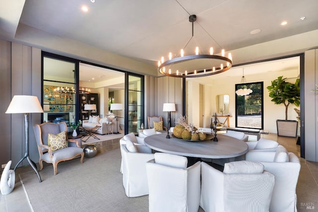 dining area with a notable chandelier and recessed lighting