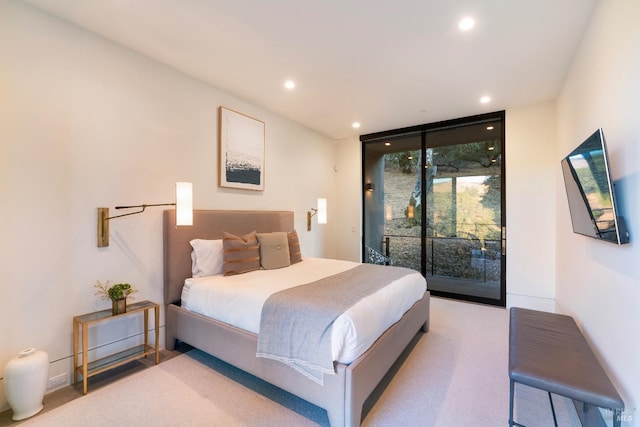bedroom featuring access to outside, baseboards, recessed lighting, carpet flooring, and floor to ceiling windows