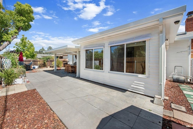 view of patio with fence